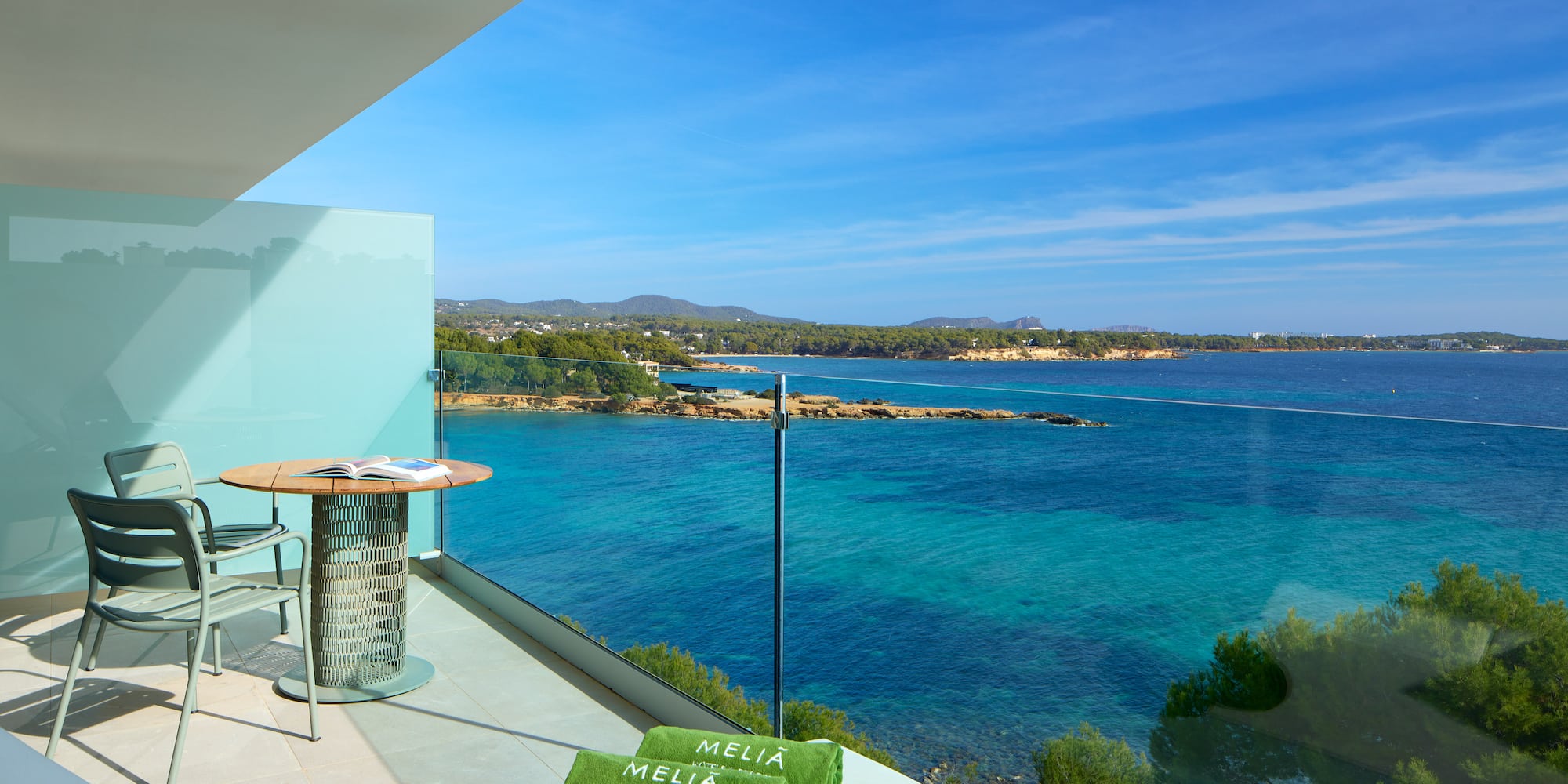 a balcony overlooking a body of water