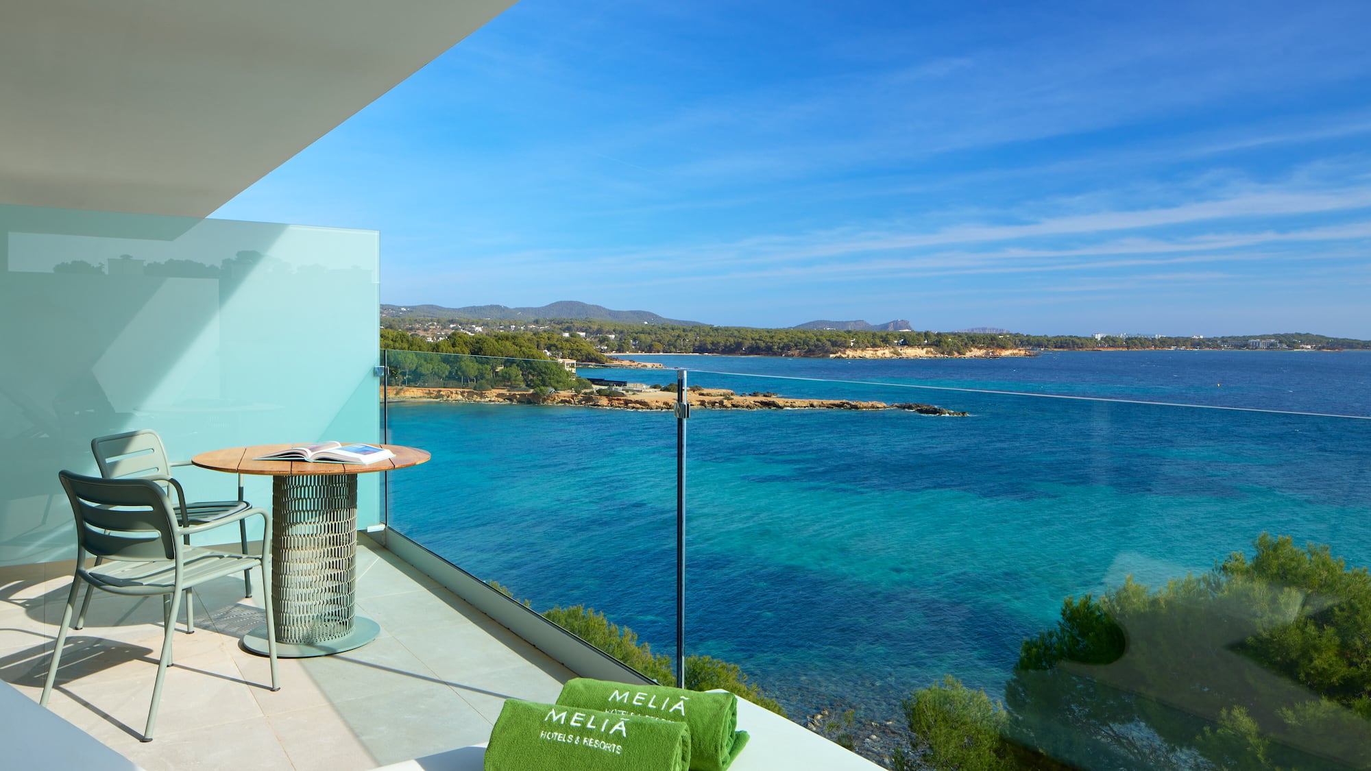 a balcony overlooking a body of water
