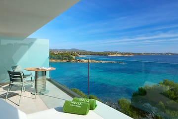 a balcony overlooking a body of water