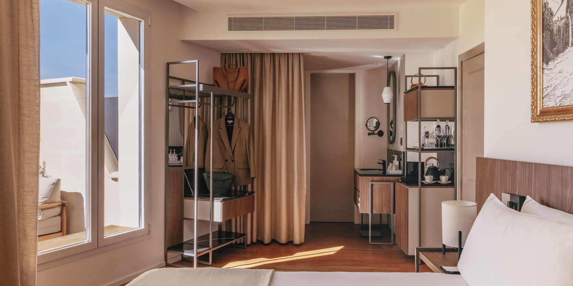 a room with a bed and a mirror