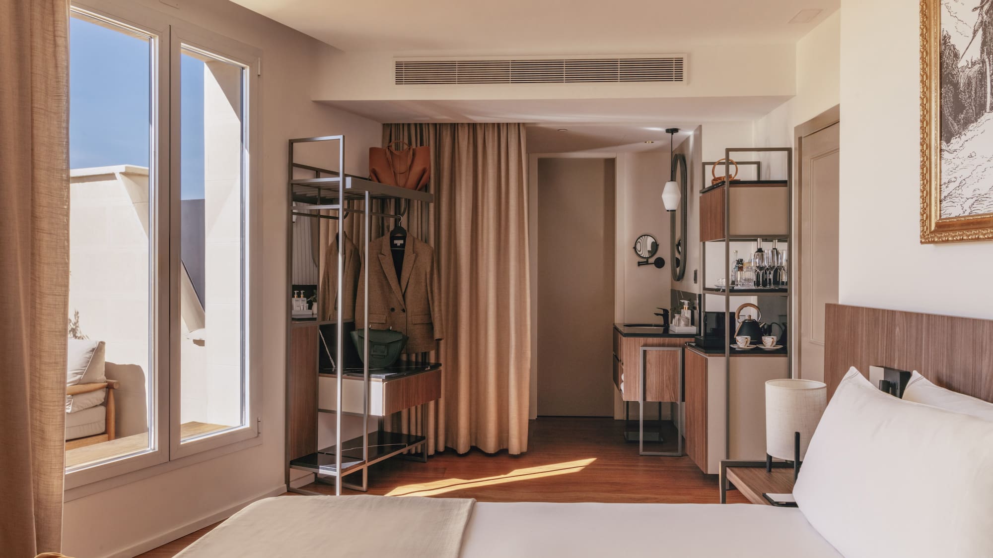 a room with a bed and a mirror