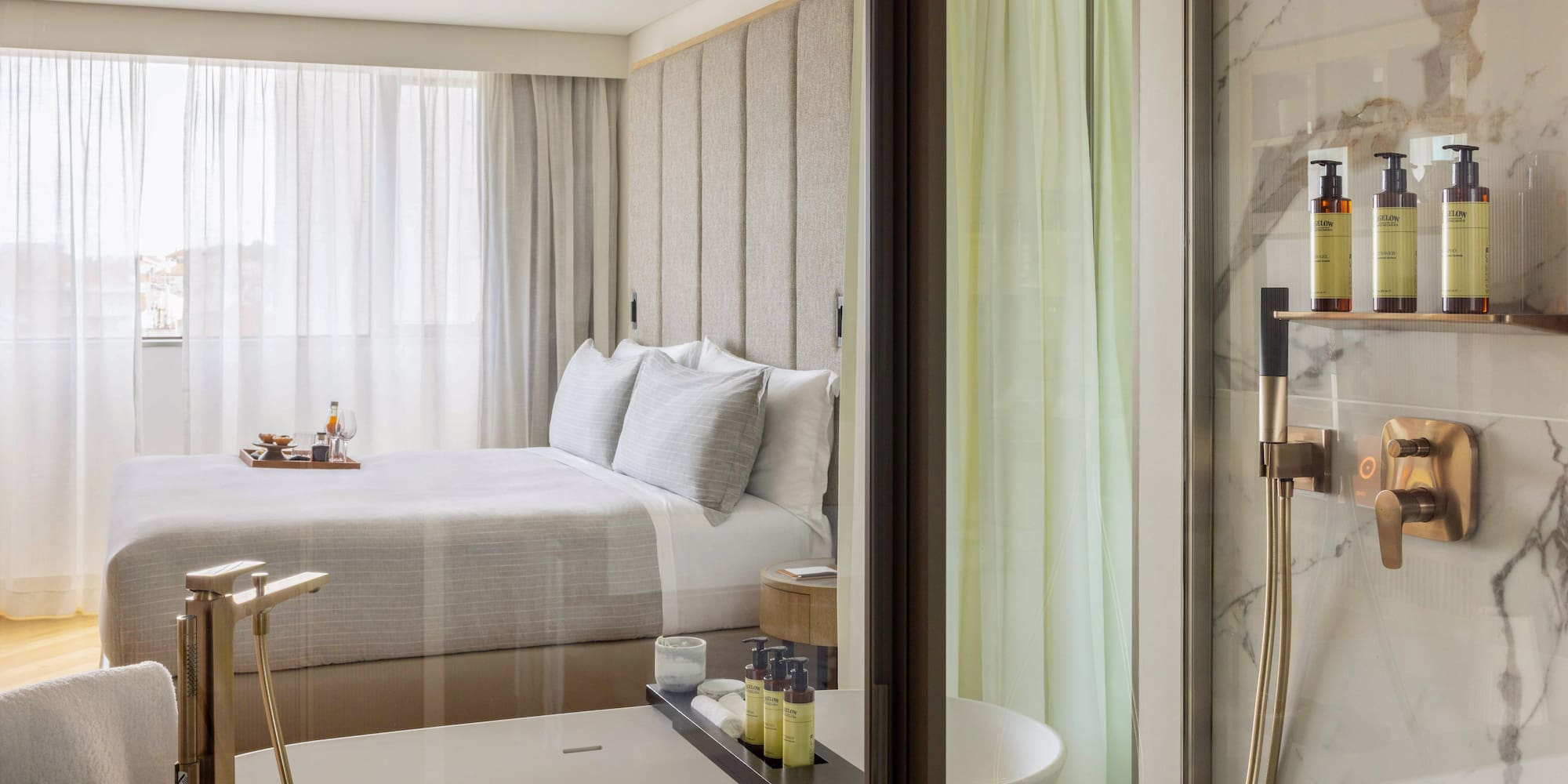 a bathroom with a bed and bathtub