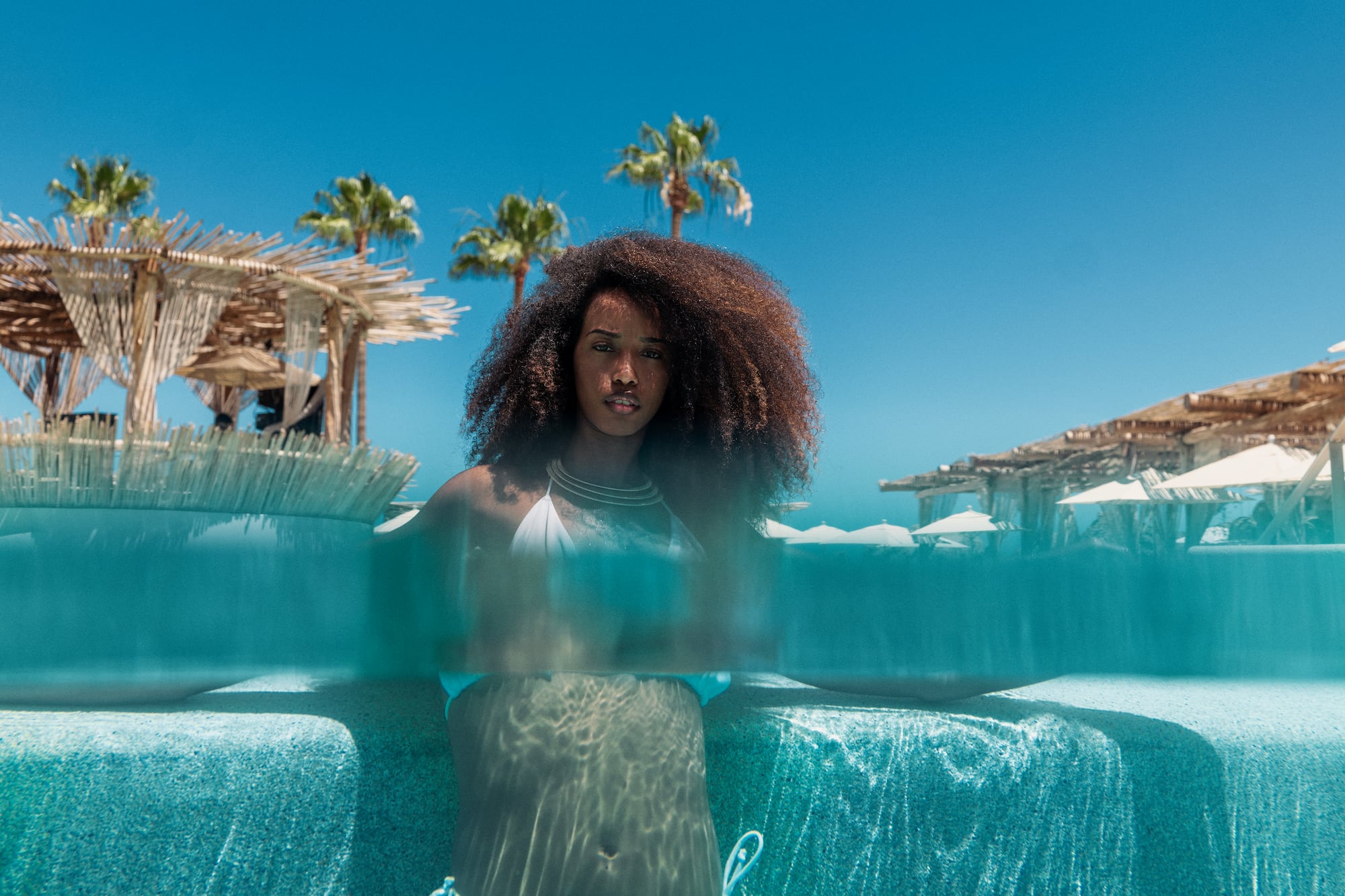 a woman in a garment in a pool