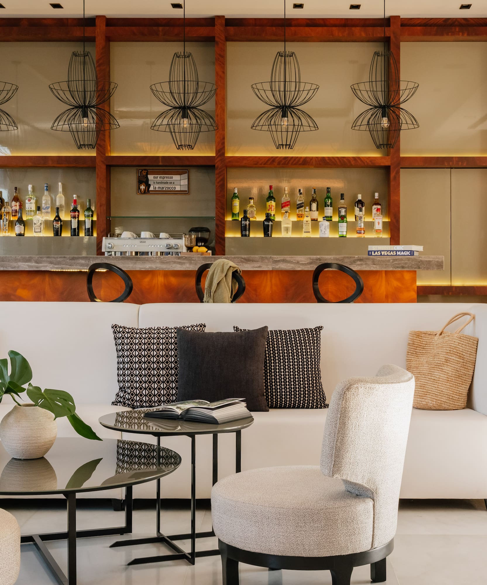 a room with a bar and a couch and a table