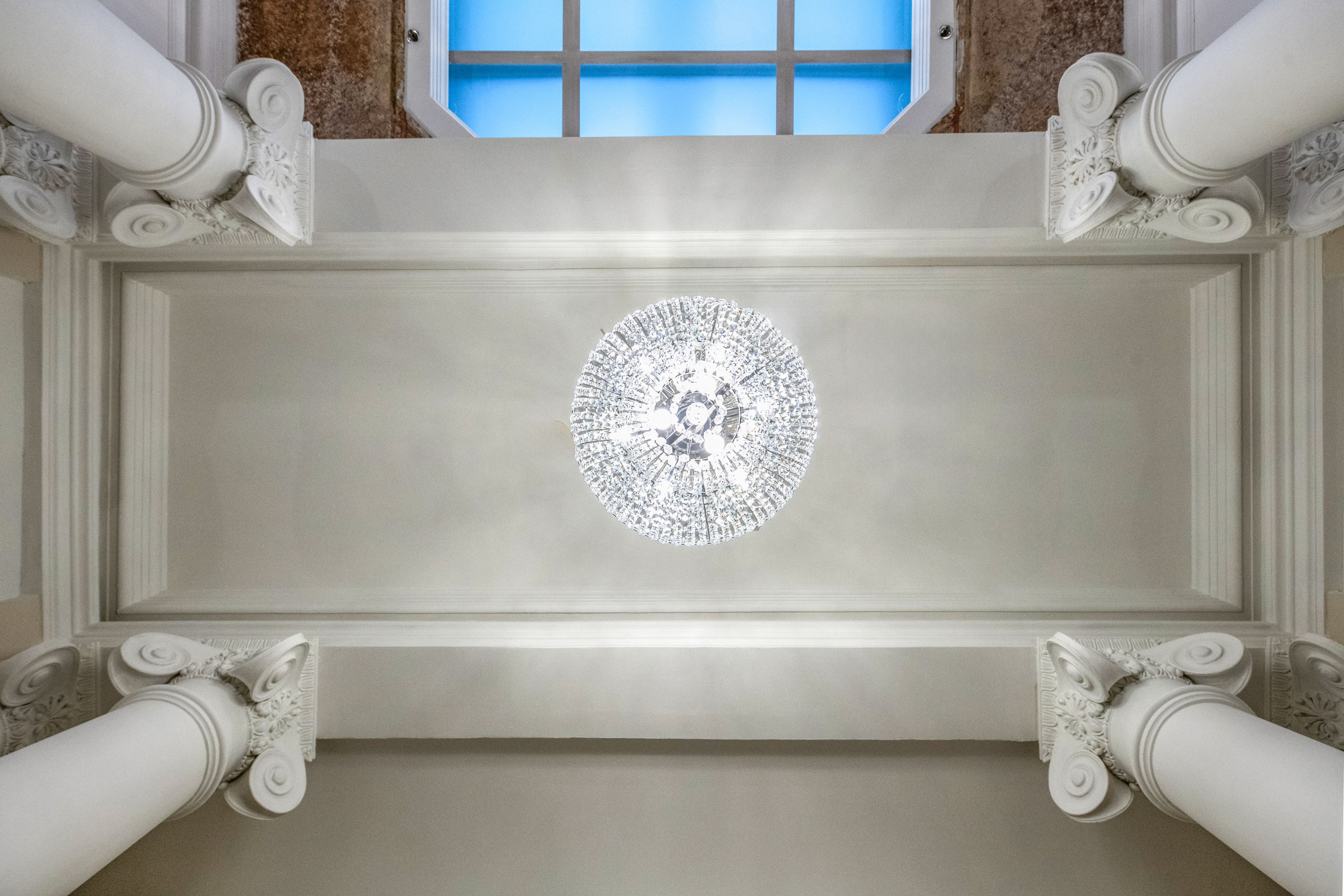a chandelier on a ceiling