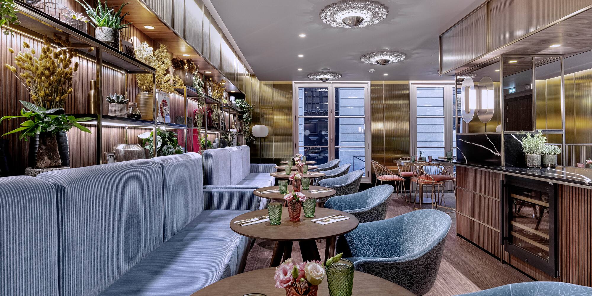 a restaurant with tables and chairs