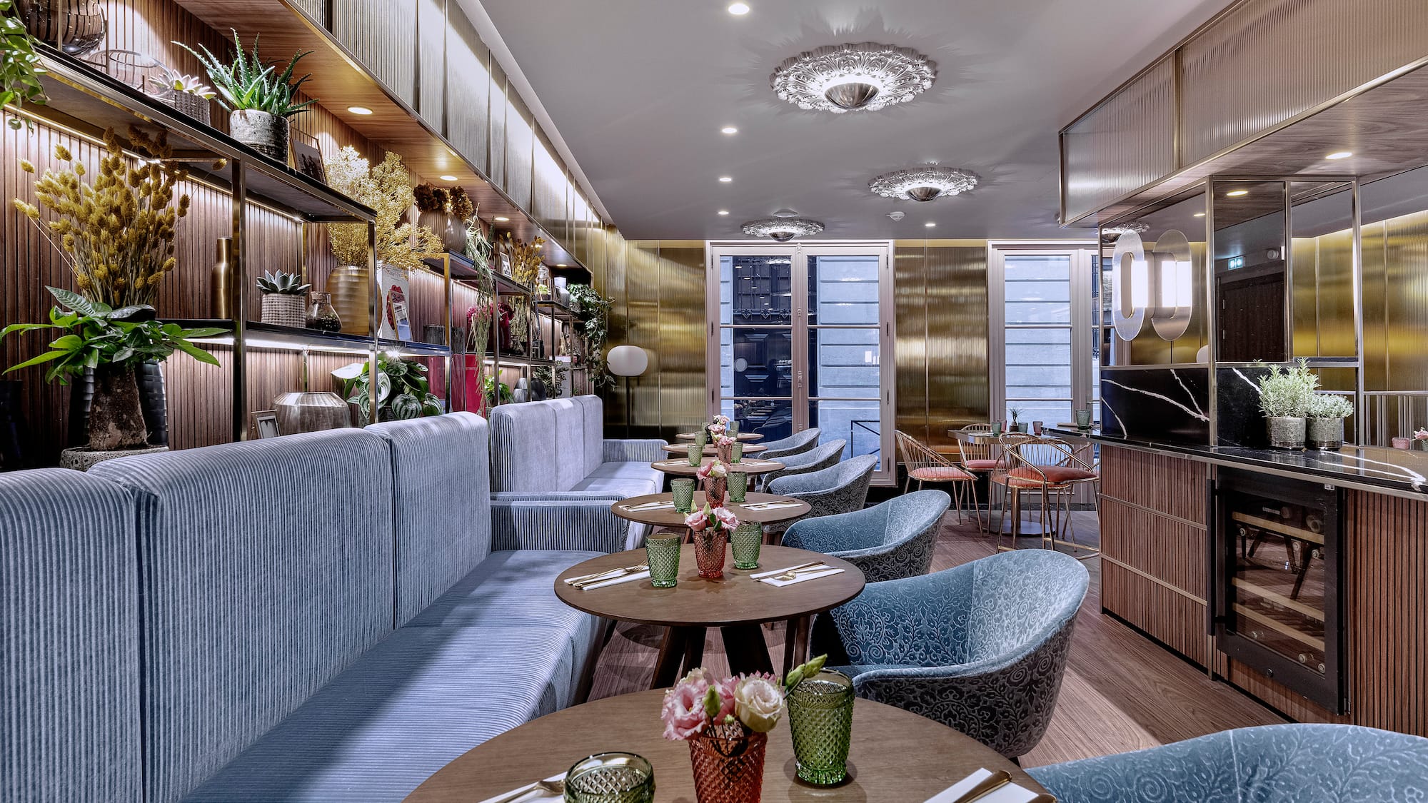 a restaurant with tables and chairs