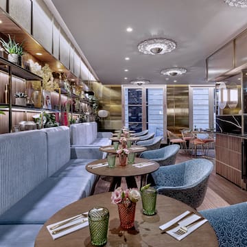a restaurant with tables and chairs