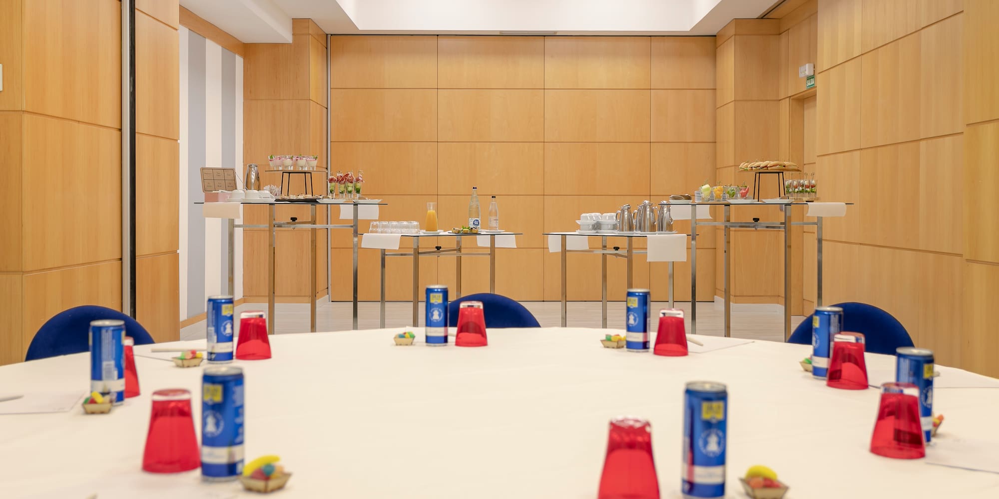 a table with drinks and cans on it