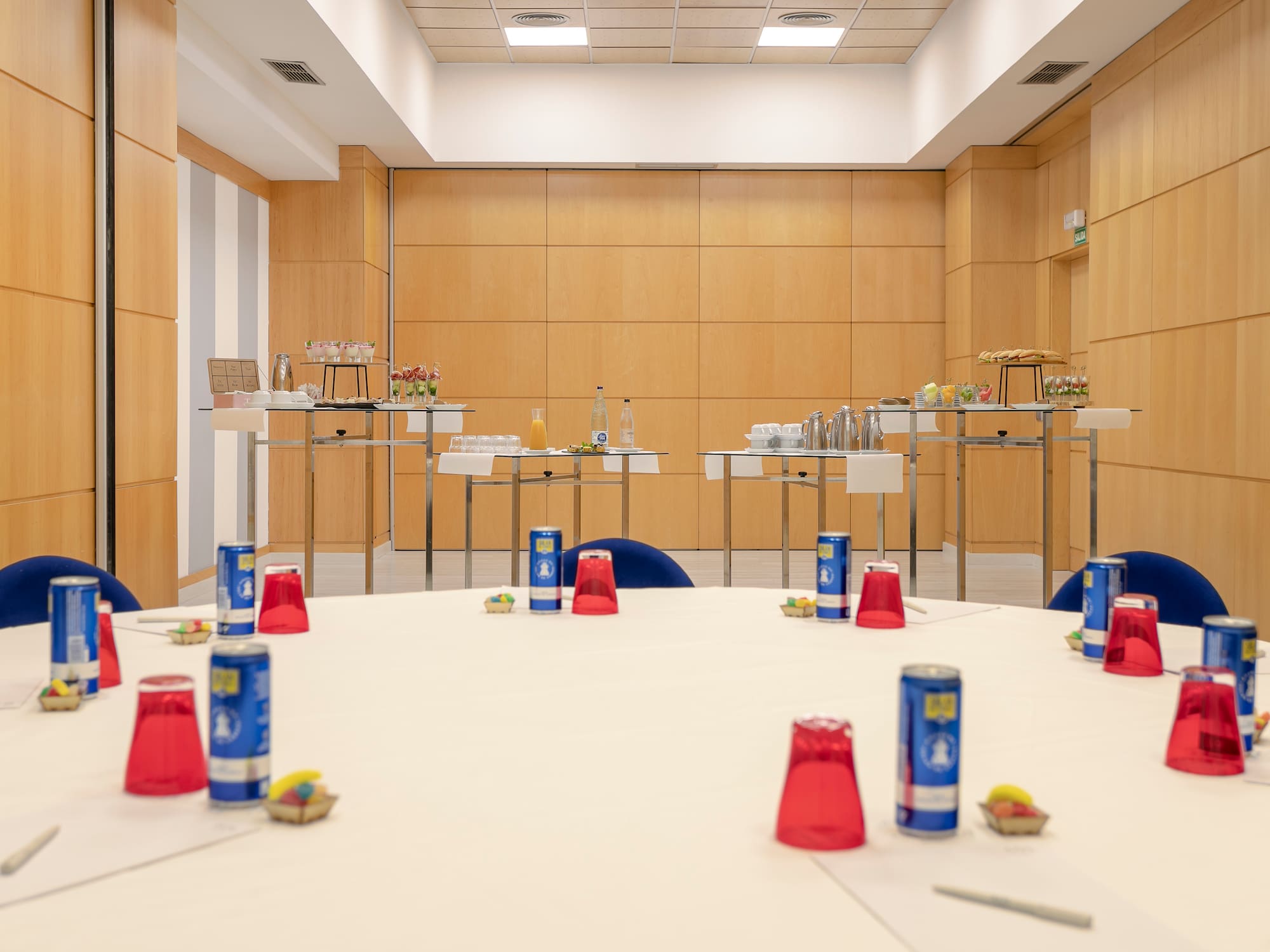 a table with drinks and cans on it