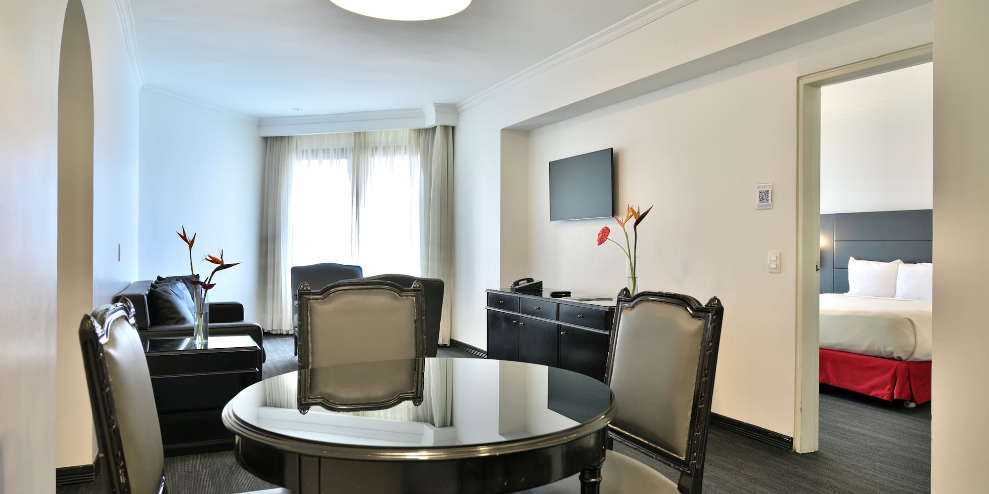 a room with a table and chairs