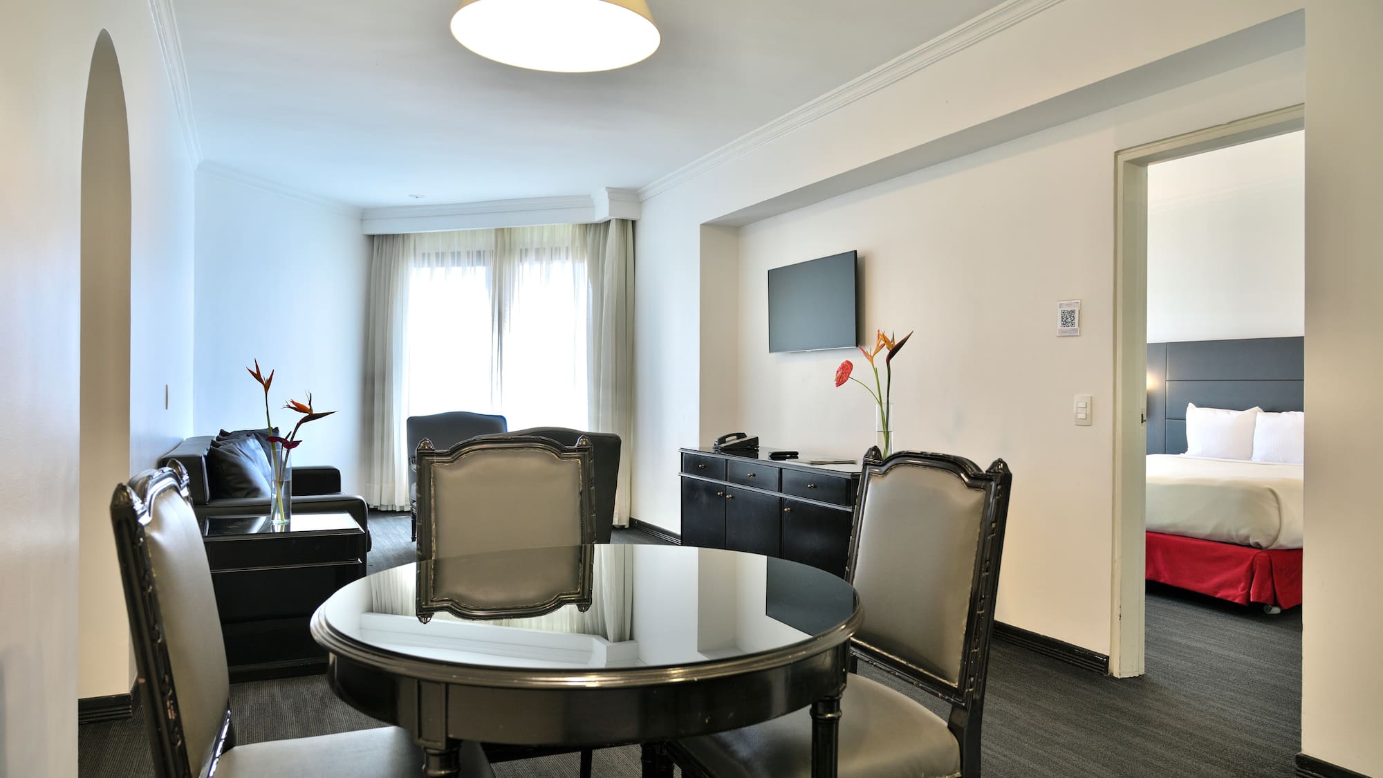 a room with a table and chairs