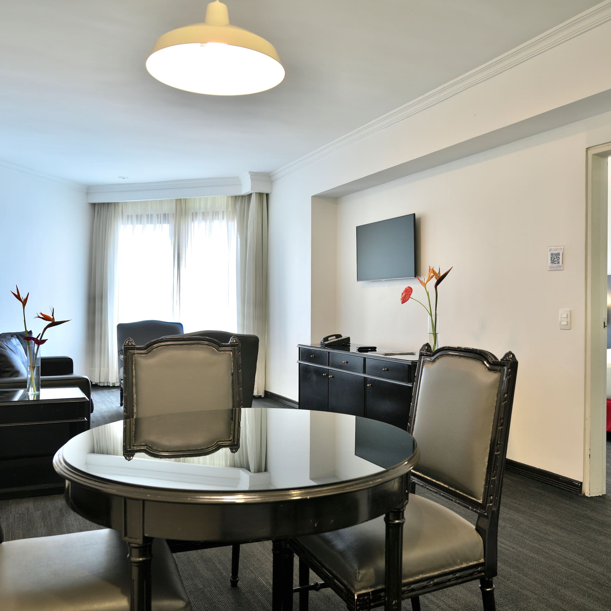 a room with a table and chairs