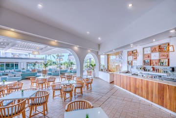 a room with tables and chairs