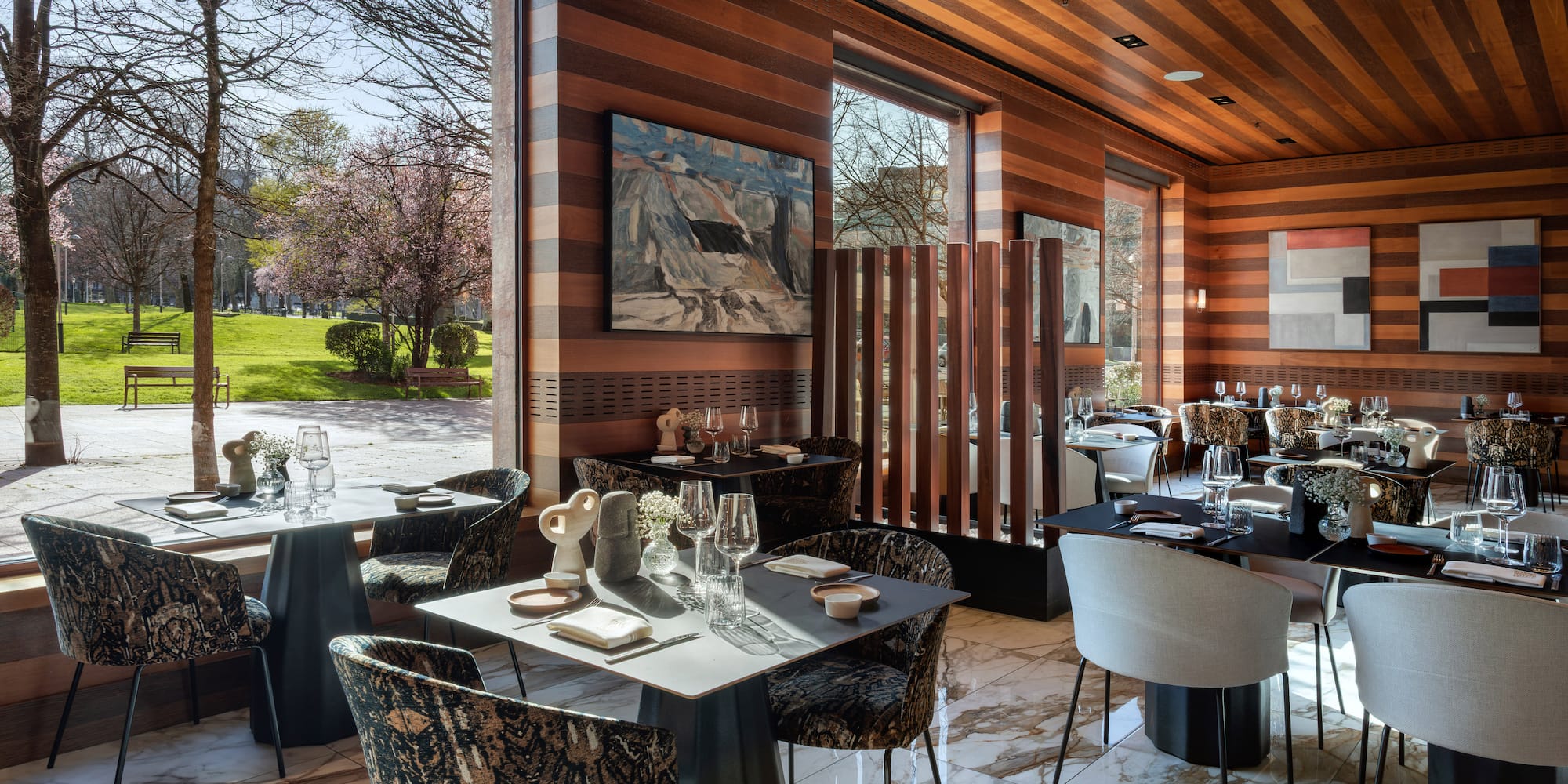 a room with tables and chairs