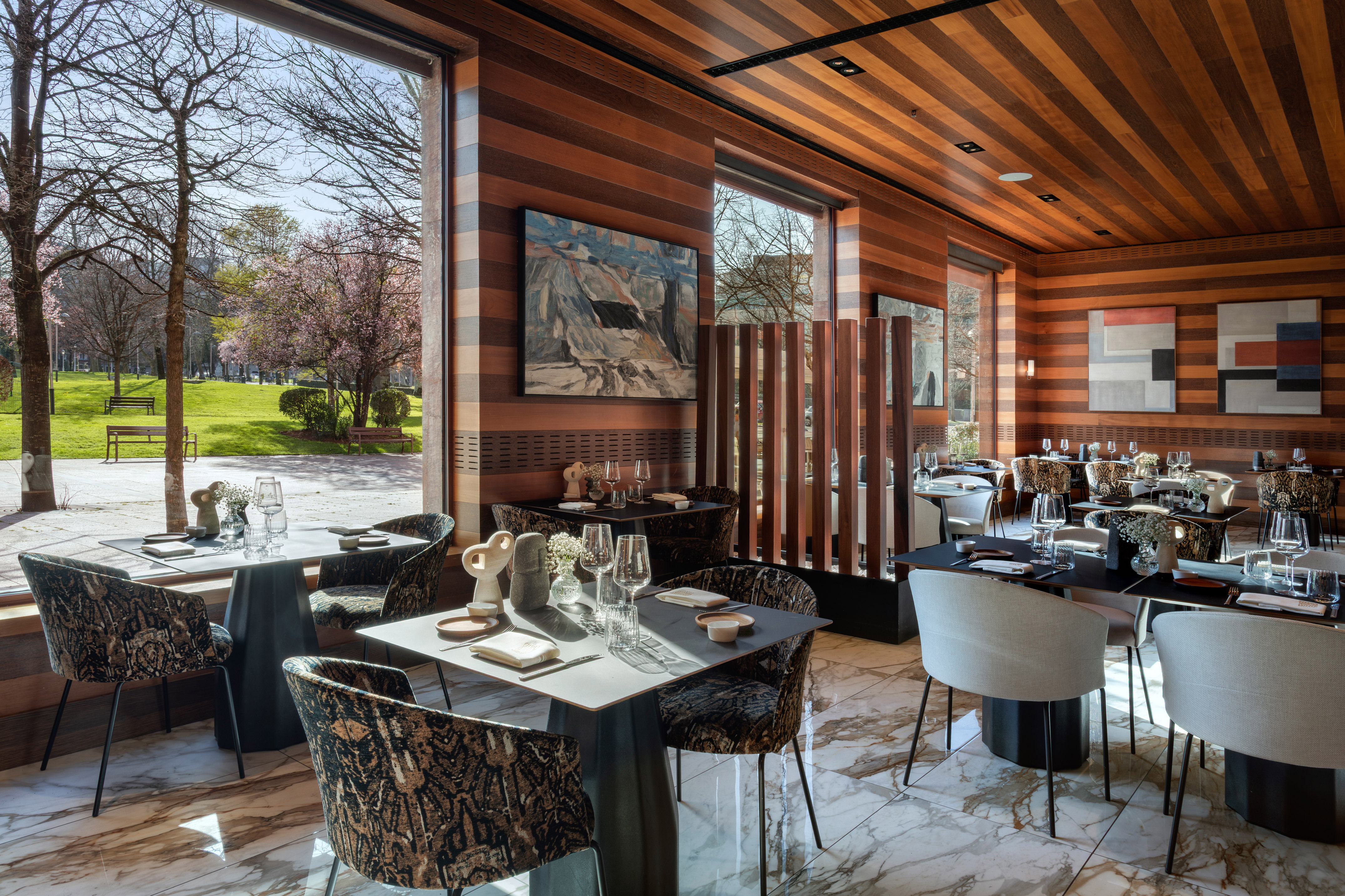 a room with tables and chairs