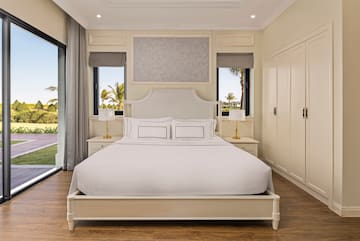 a bedroom with a bed and a closet