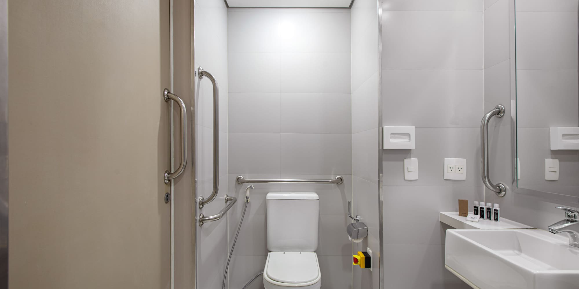 a bathroom with a toilet and sink