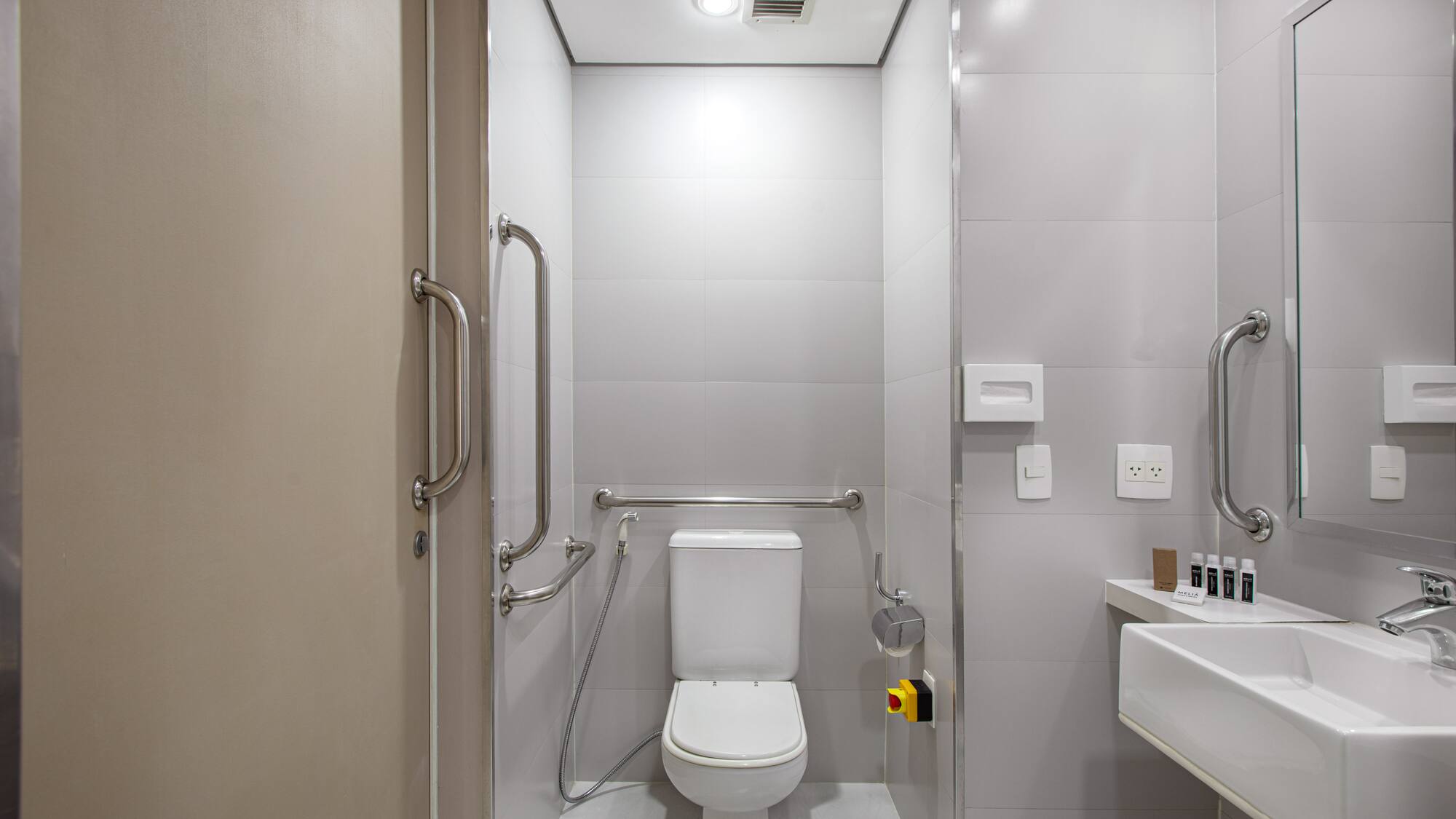 a bathroom with a toilet and sink