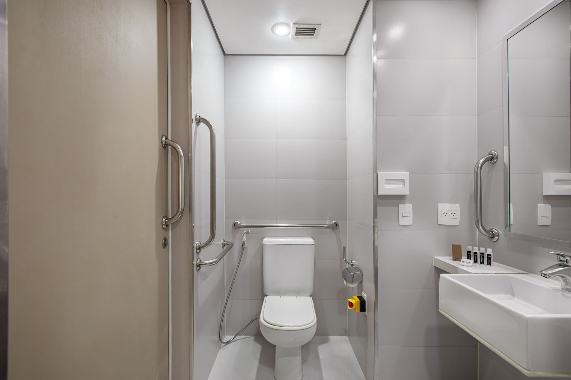 a bathroom with a toilet and sink