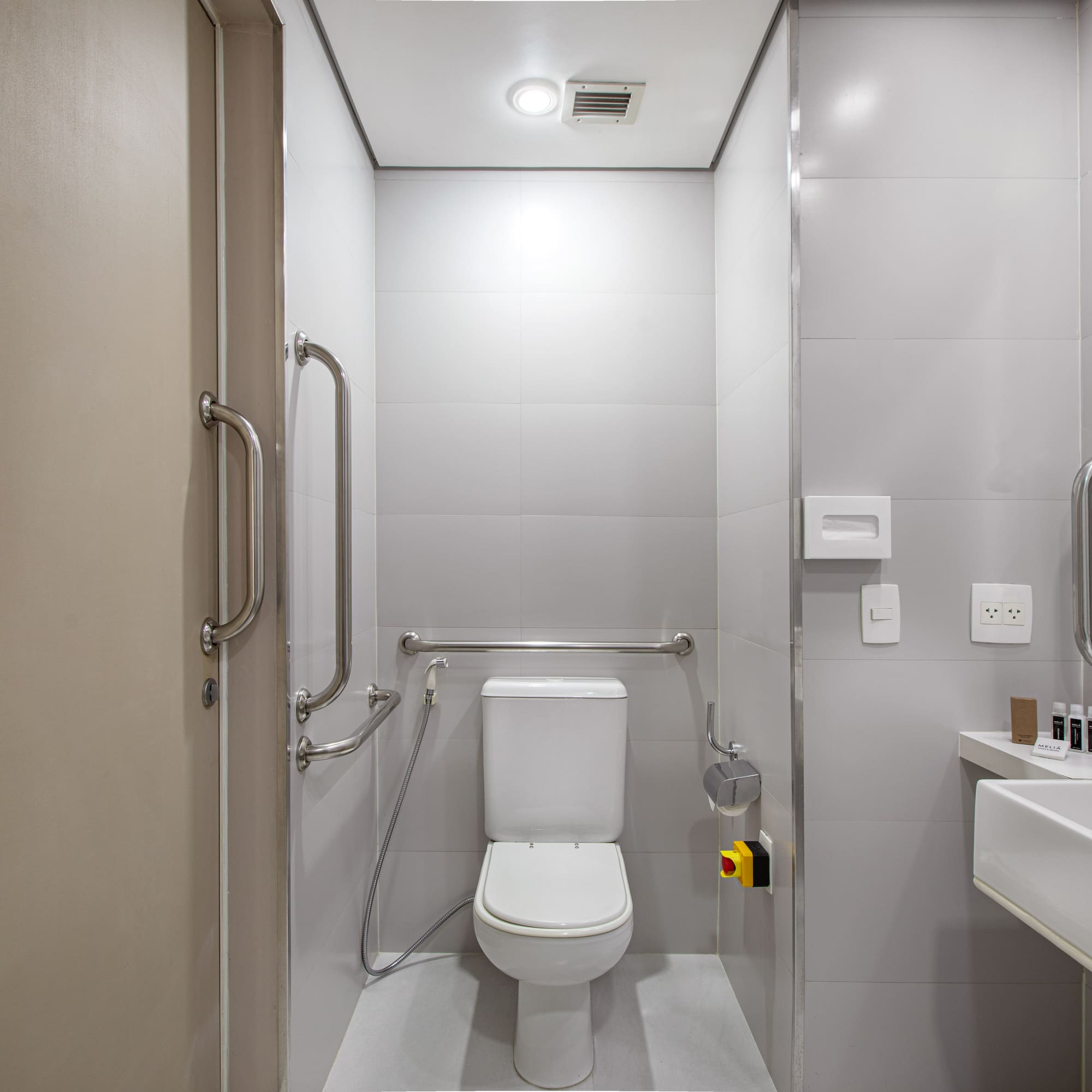 a bathroom with a toilet and sink