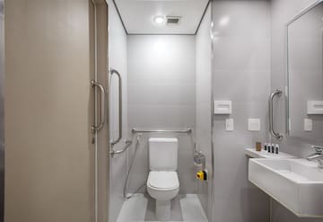 a bathroom with a toilet and sink