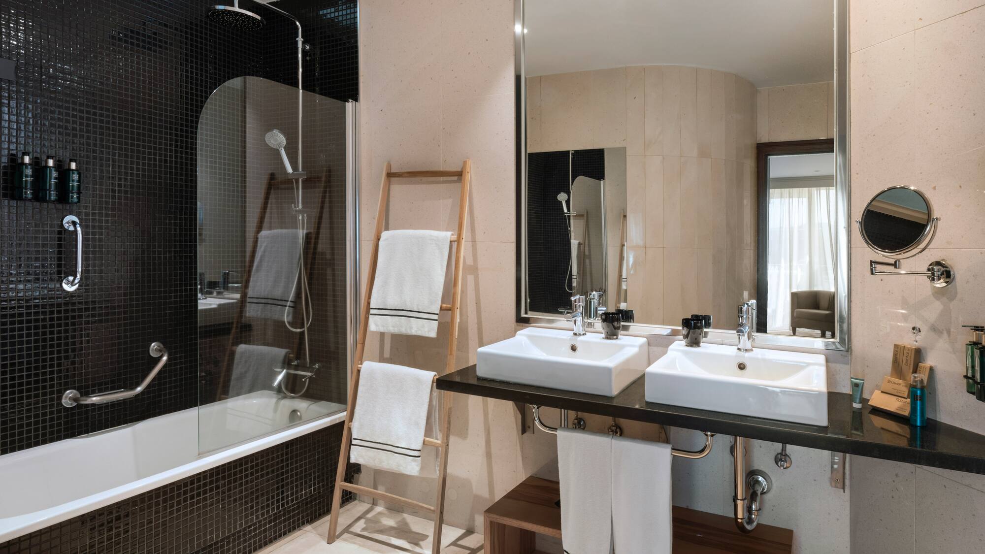 a bathroom with a shower and sink