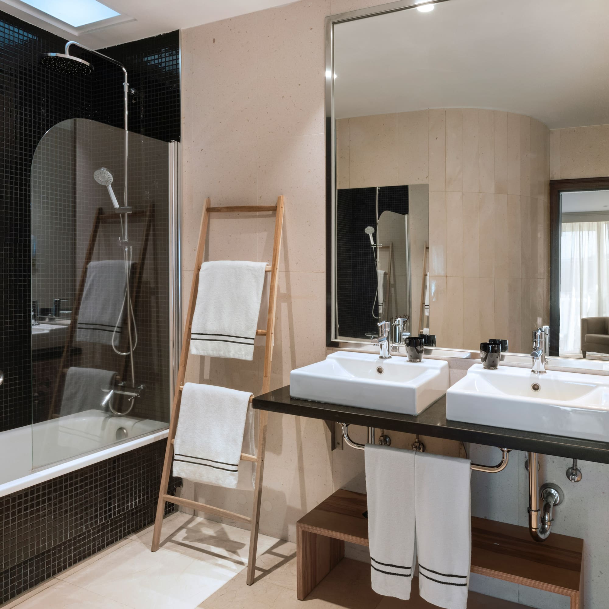 a bathroom with a shower and sink