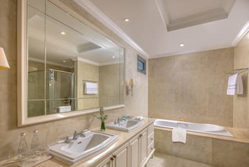 a bathroom with a large mirror and sink