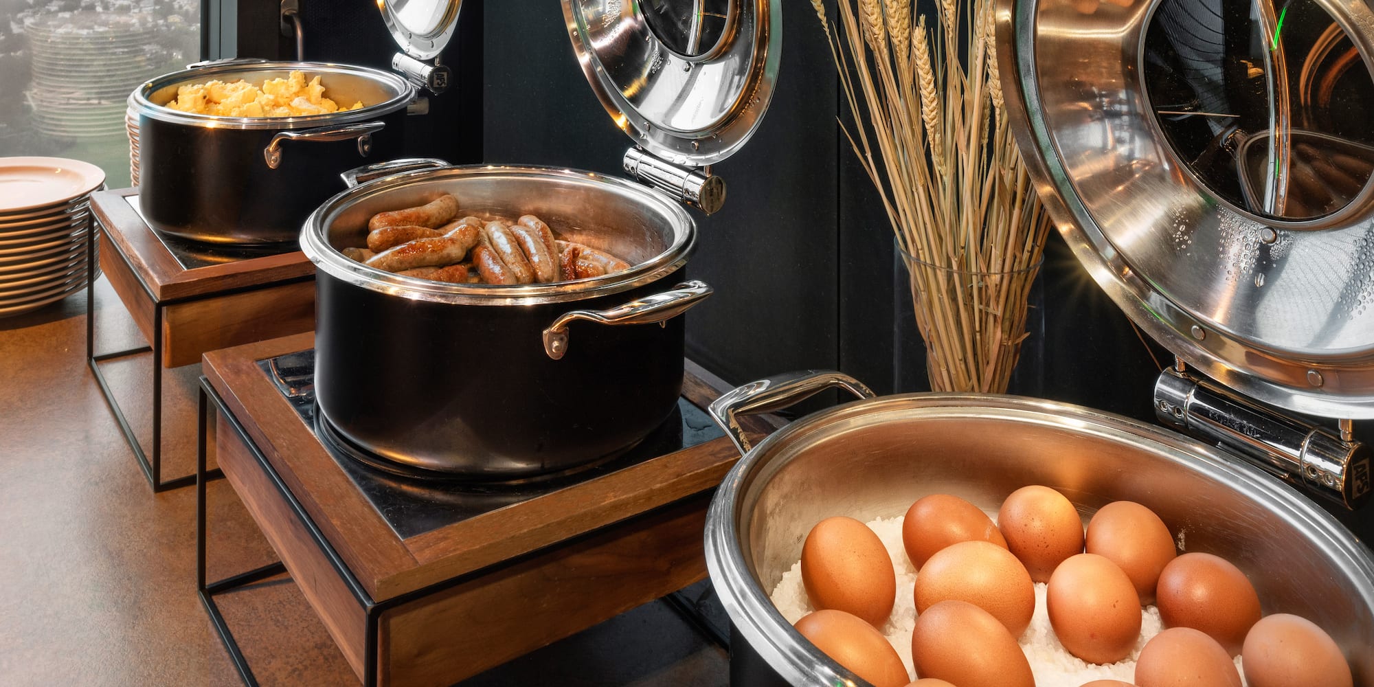 a group of pots with food in them
