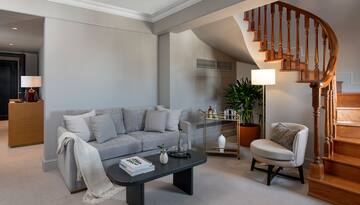 a living room with a couch and a coffee table