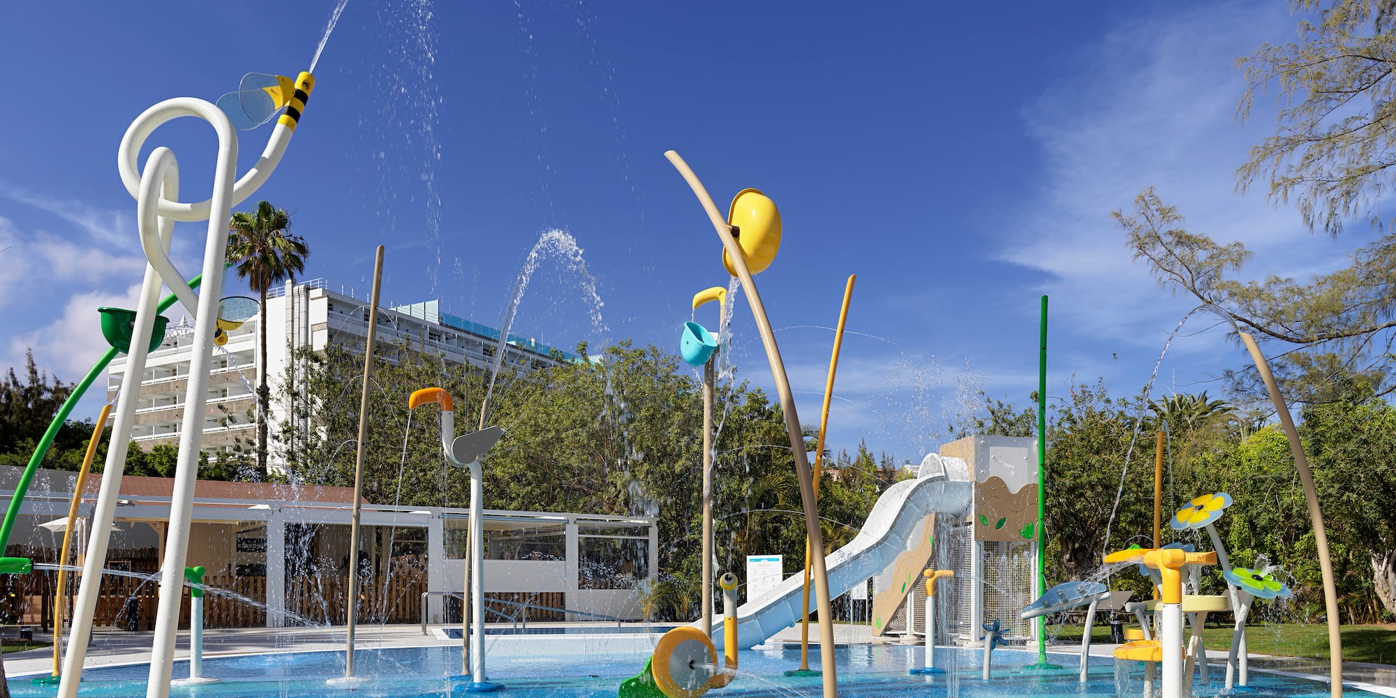 a water park with a slide and a slide