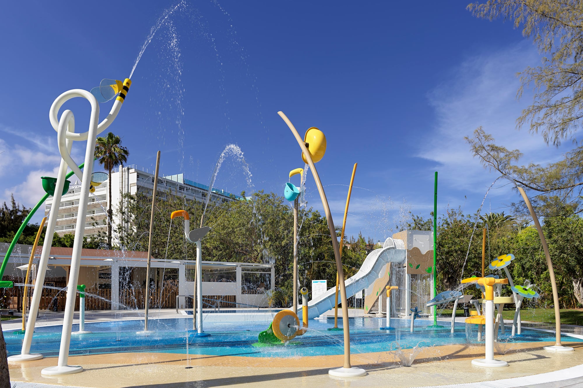 a water park with a slide and a slide