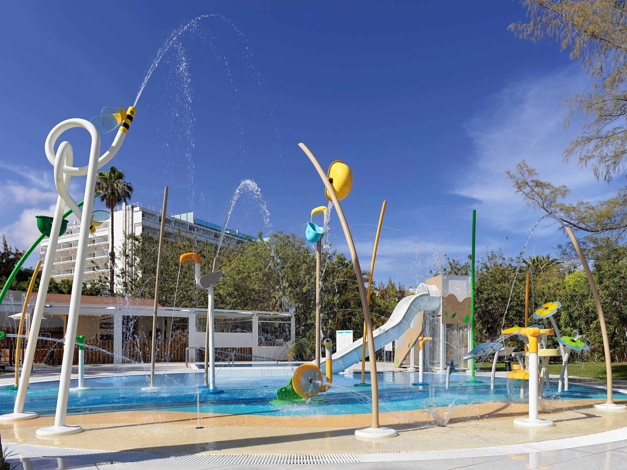 a water park with a slide and a slide