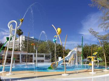 a water park with a slide and a slide