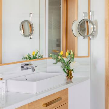 a bathroom with a sink and mirror