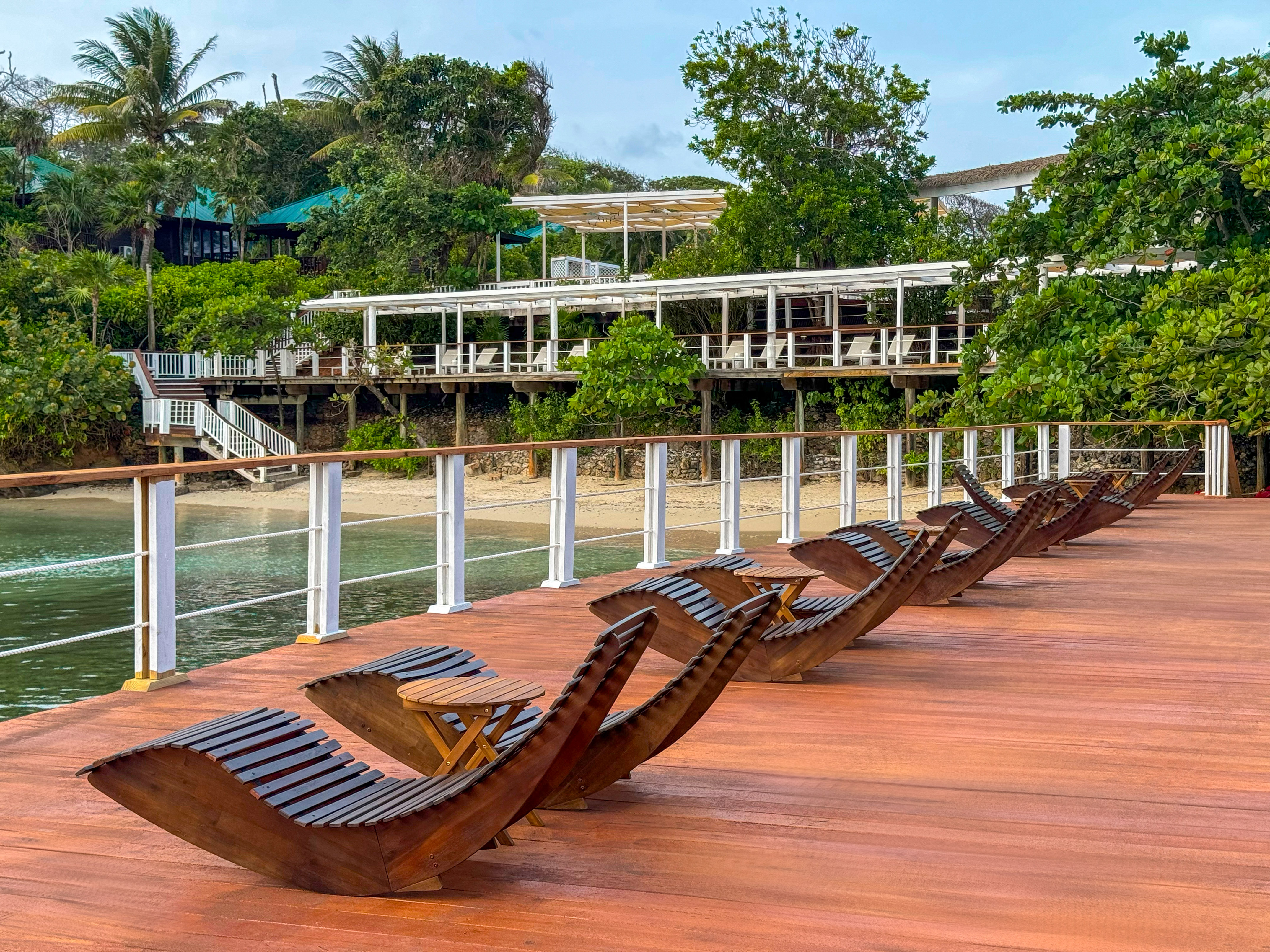 a deck with chairs on it