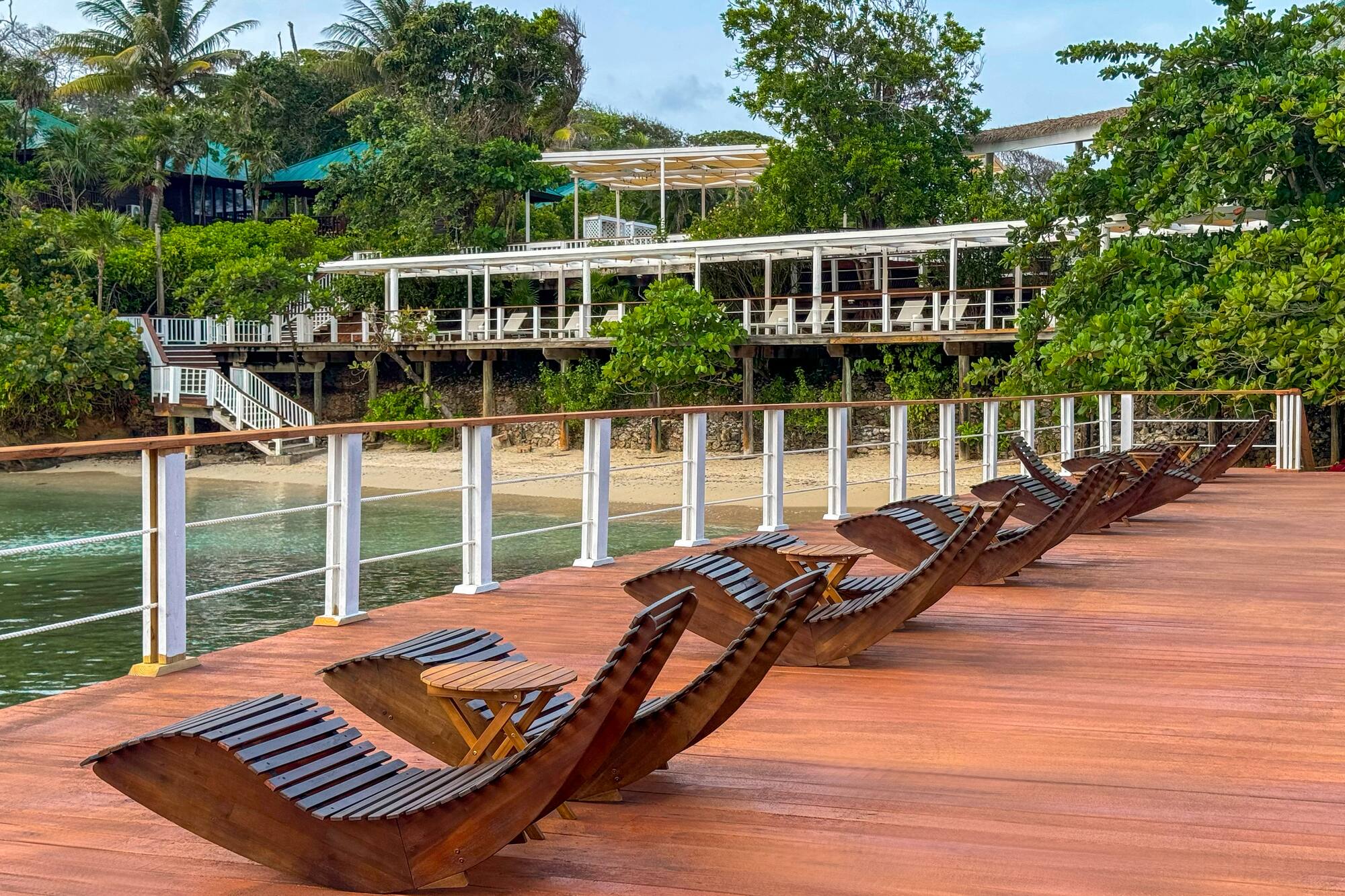 a deck with chairs on it