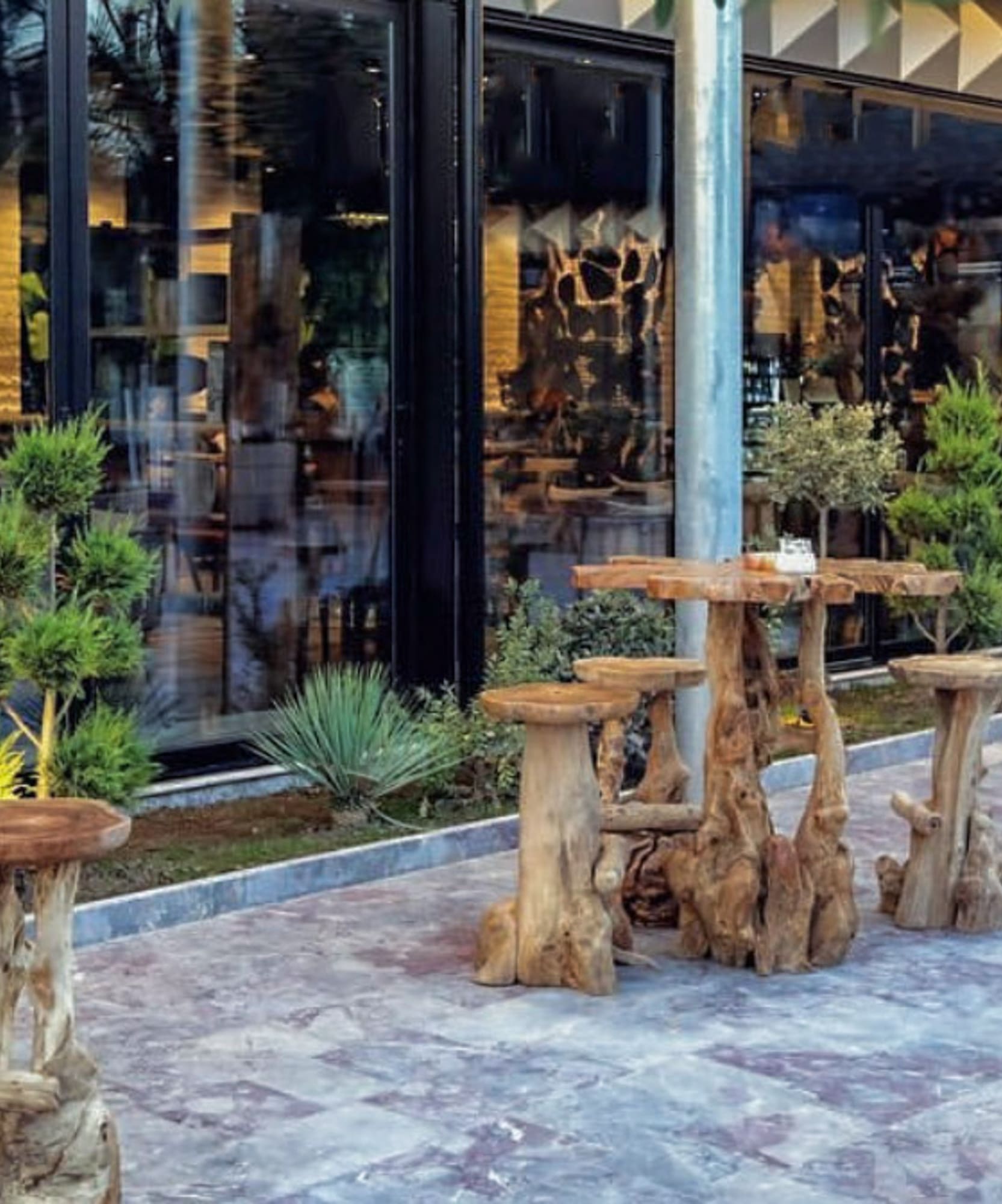 a table and chairs outside a building