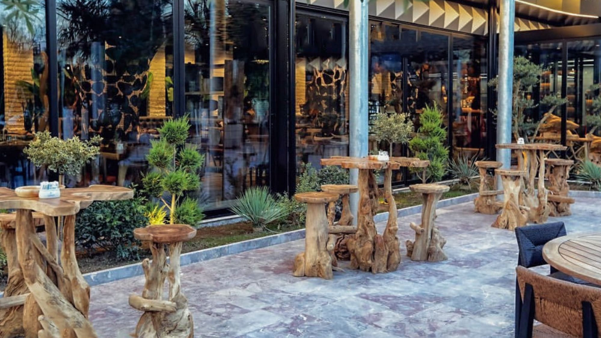a table and chairs outside a building