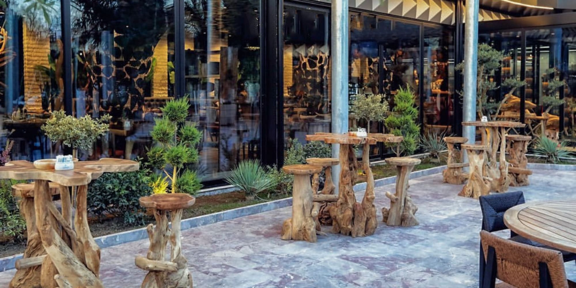 a table and chairs outside a building