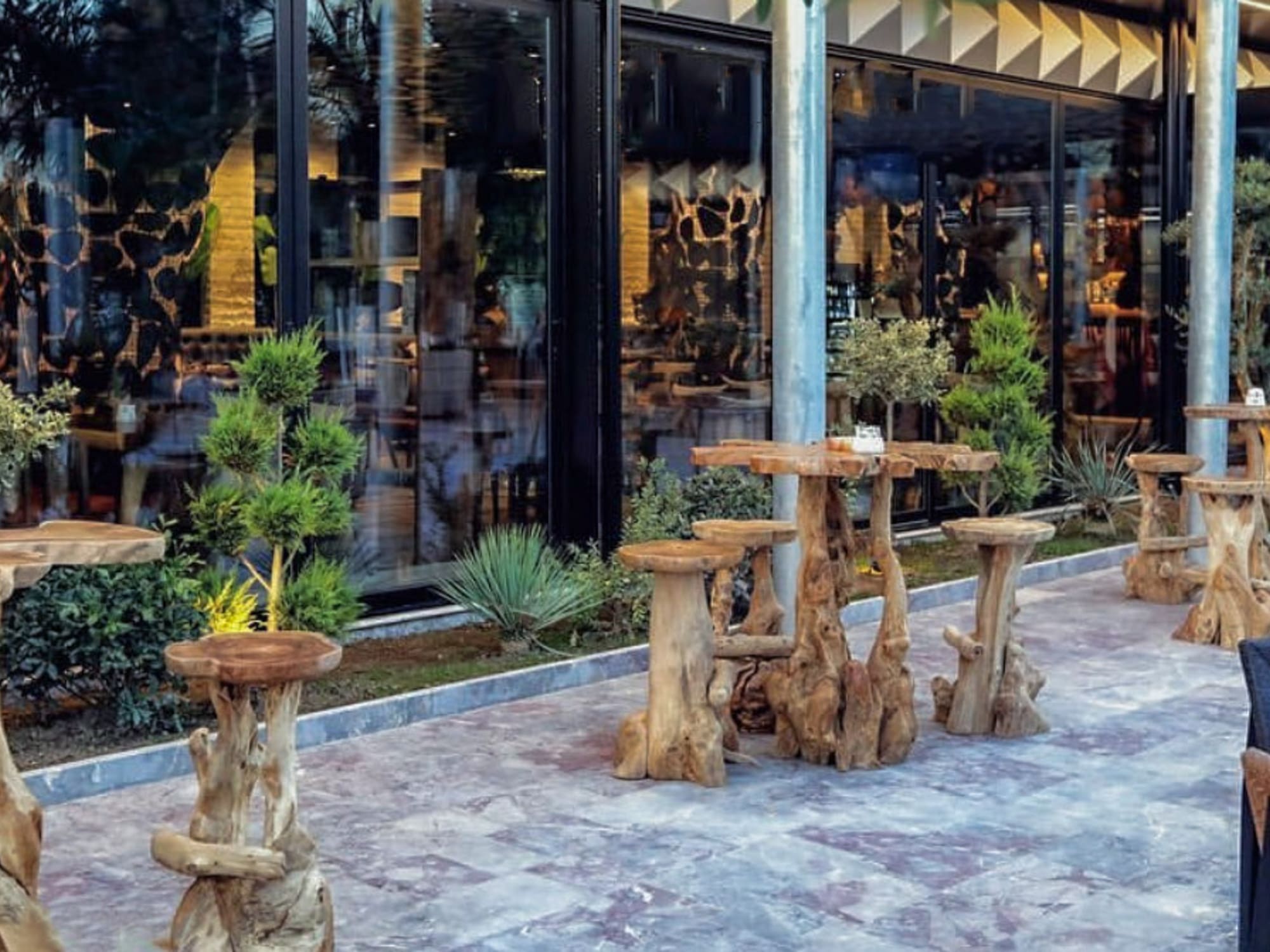 a table and chairs outside a building