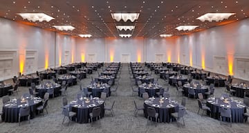 a large room with tables and chairs