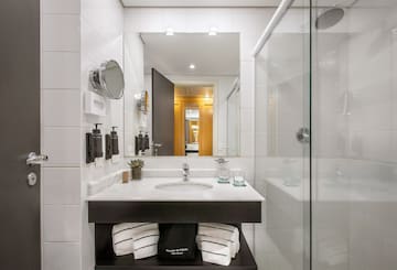 a bathroom with a mirror and a sink