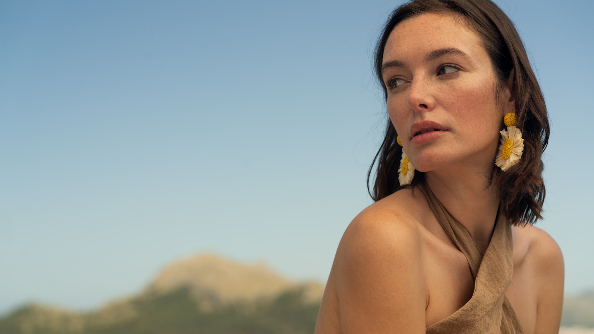 a woman looking away from the camera