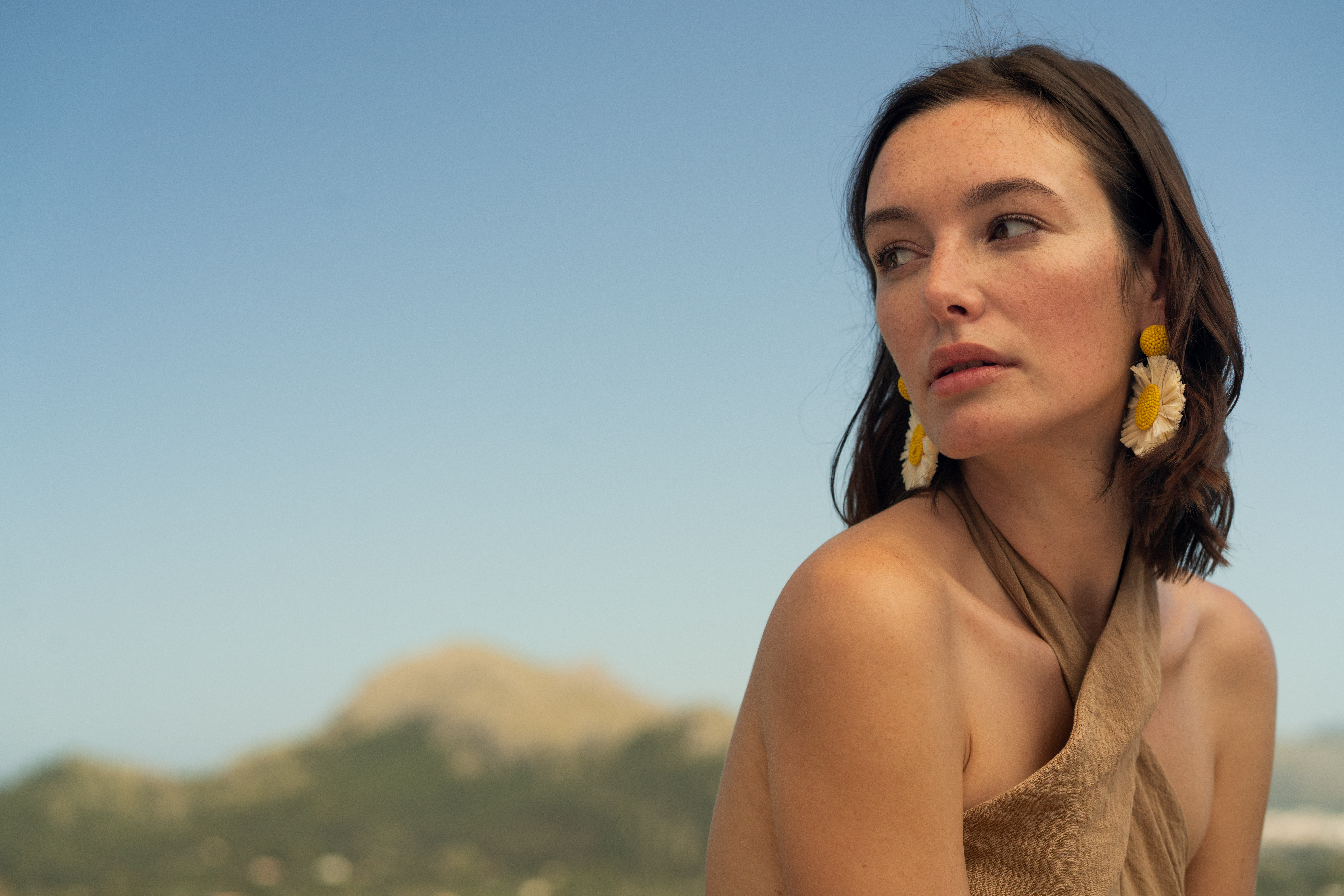 a woman looking away from the camera