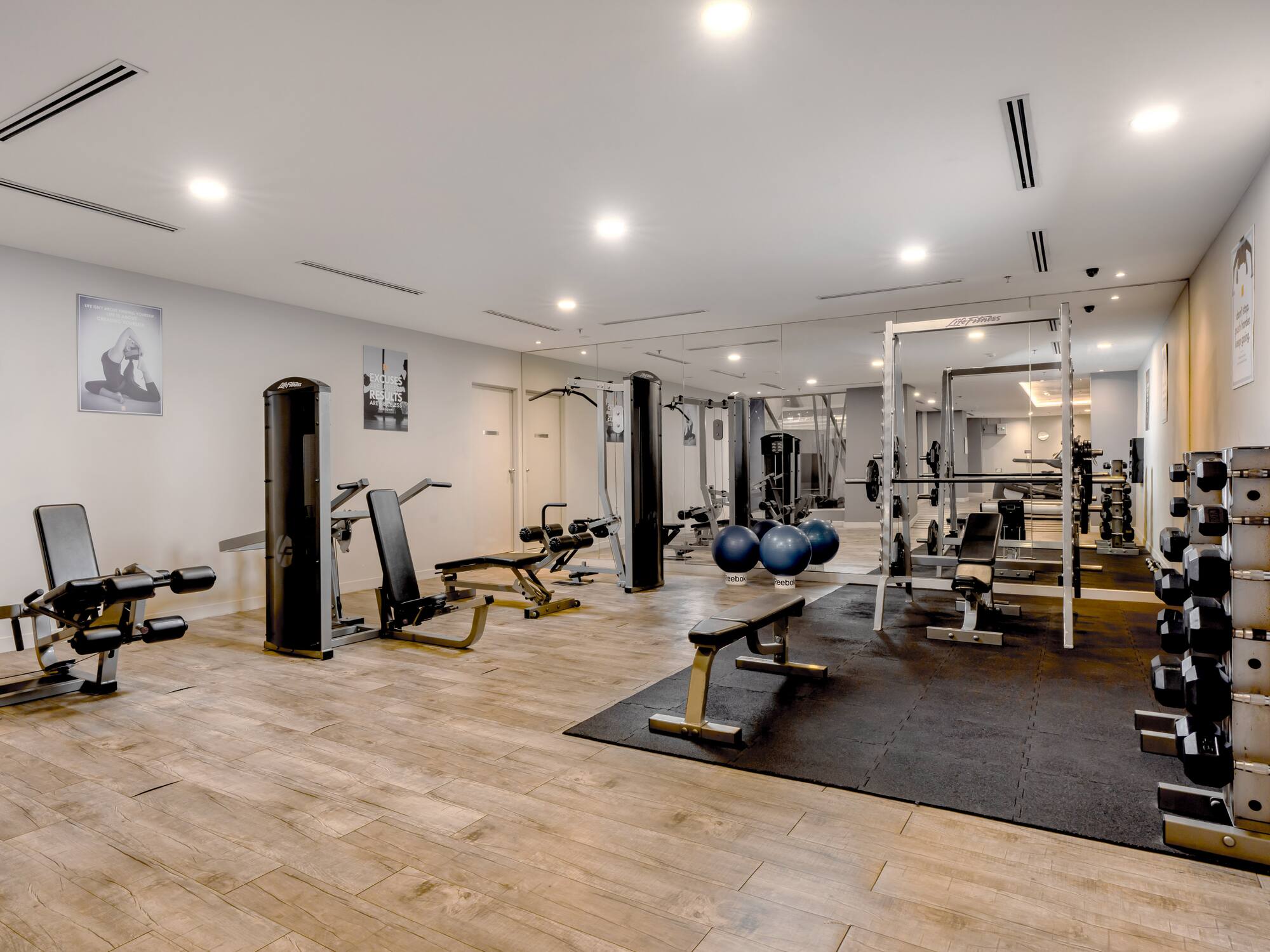 a large room with exercise equipment