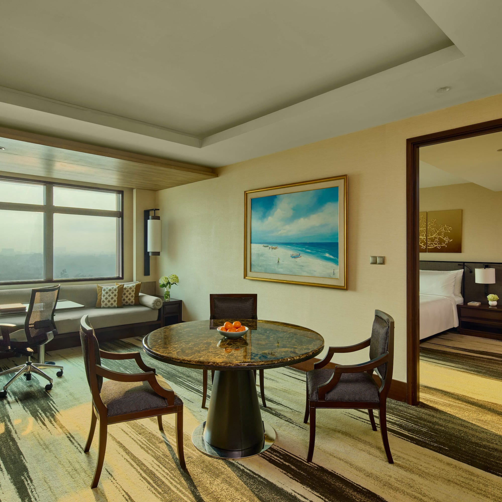 a room with a table and chairs