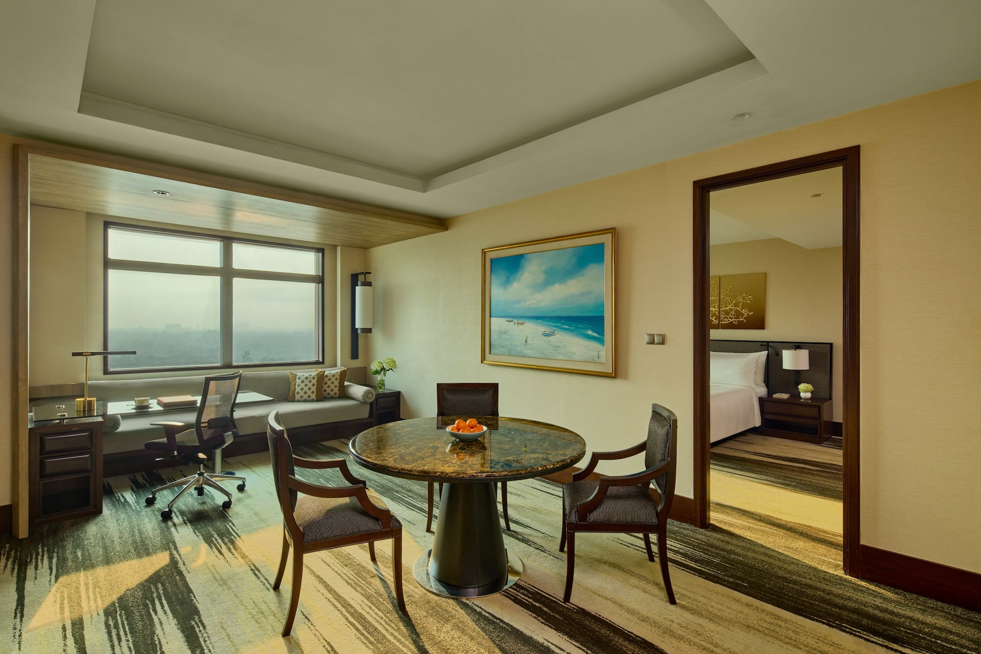 a room with a table and chairs