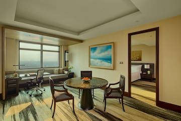 a room with a table and chairs